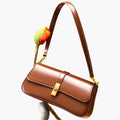 Luxuriöse schwarze Damen-Baguette-Tasche aus echtem Leder, elegant und kompakt