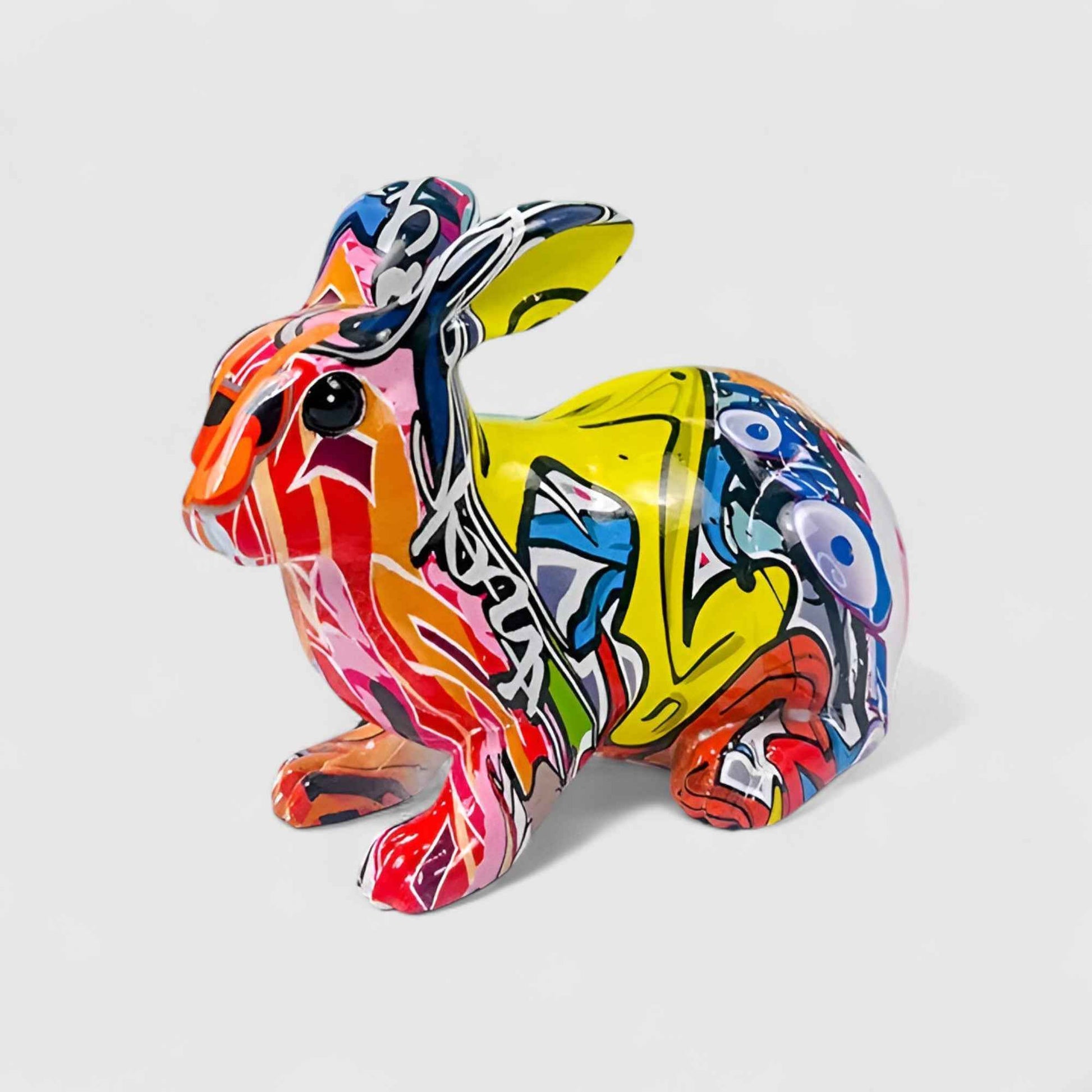 Figurines et Statues : Ornement de Table Lapin en Résine Multicolore - Décoration Charmante pour Votre Intérieur dans Assise 12cm de haut de Marche Lino