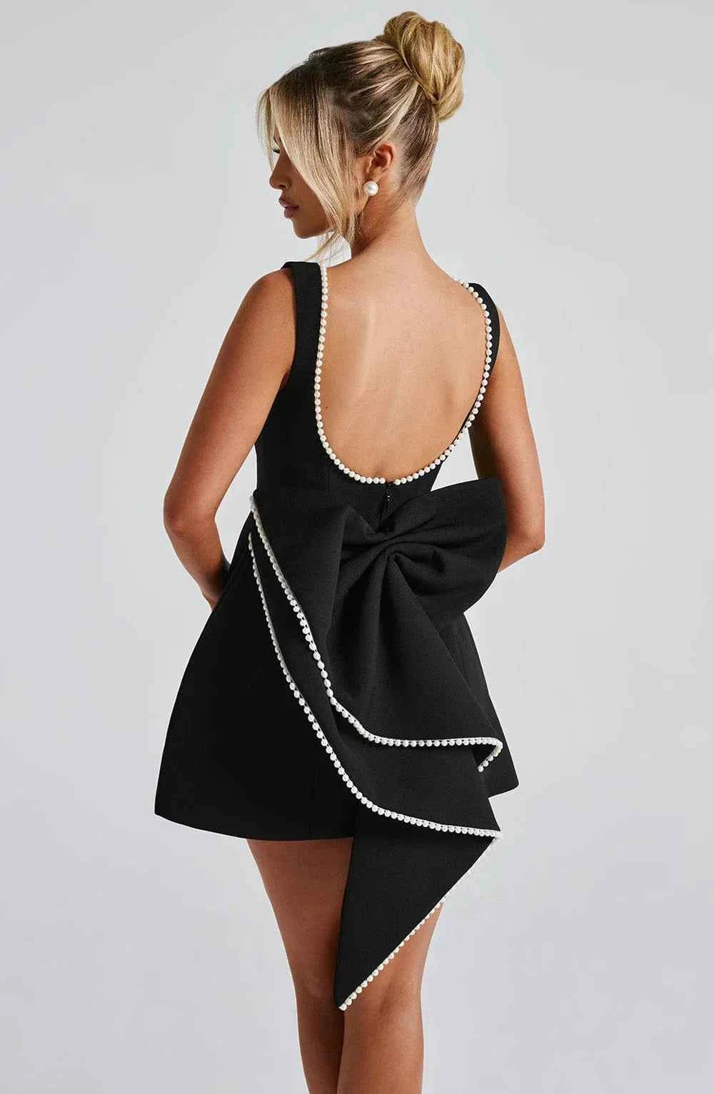 Robe courte femme avec nœud décoratif au dos